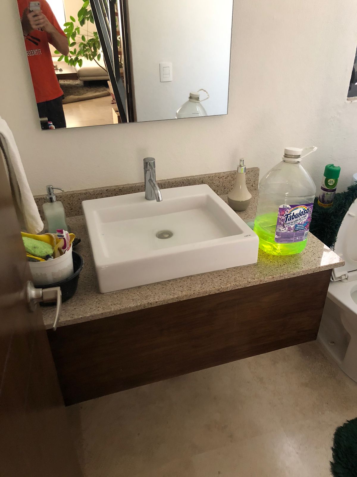 Clean bathroom with a vessel sink and mirror